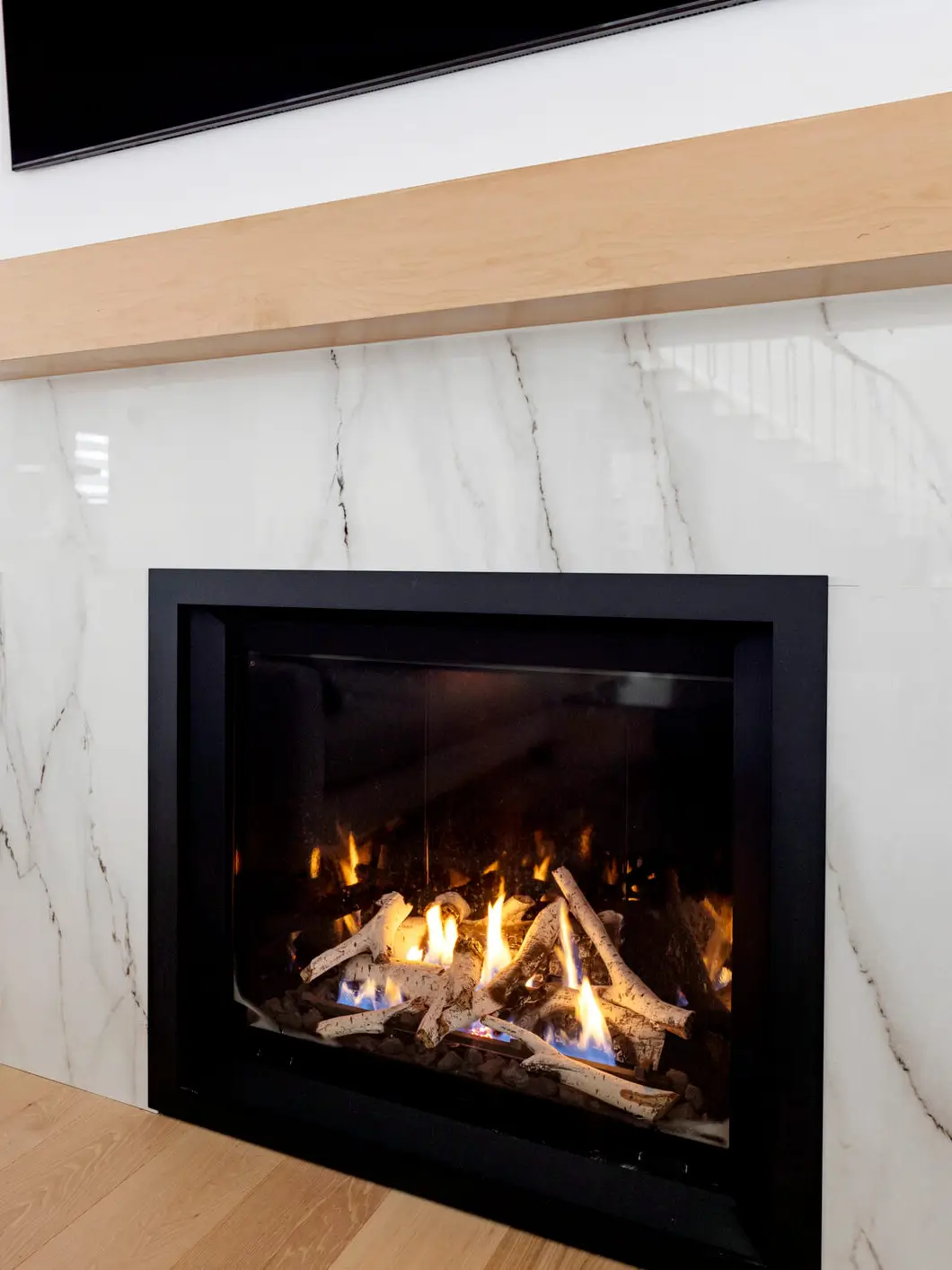 Cozy fireplace with burning logs